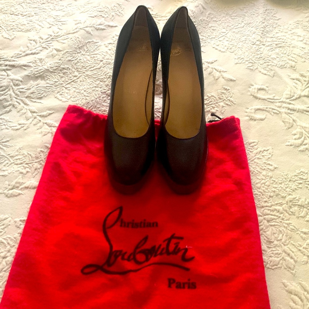 Worn Louboutin black high heels. European size 36 or 6